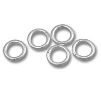 Five silver metal jump rings